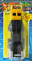 BLAST-BOT Switch-A-Robots Black Body Yellow Head with Grey Wheels on Card
